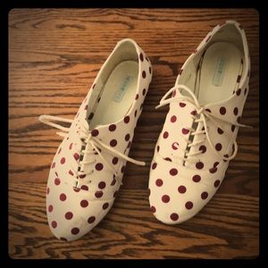 White/cream polka dotted flats